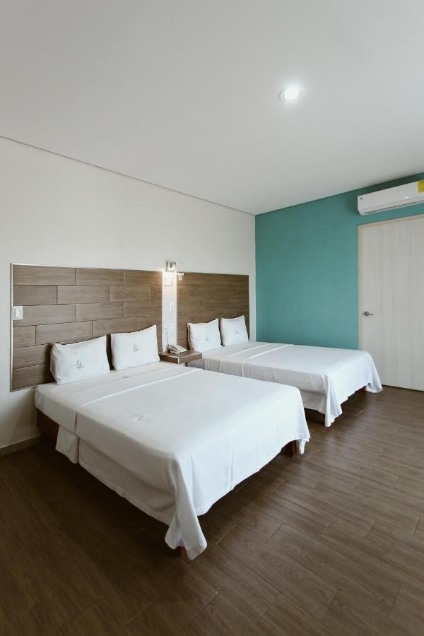 Hotel Guiva Aeropuerto Oaxaca Экстерьер фото