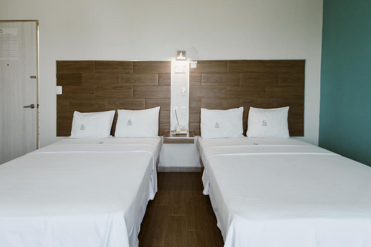 Hotel Guiva Aeropuerto Oaxaca Экстерьер фото